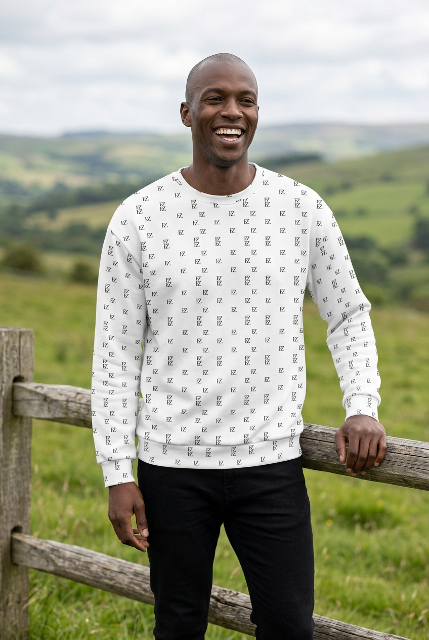 East African Black man laughing beside a hillside fence