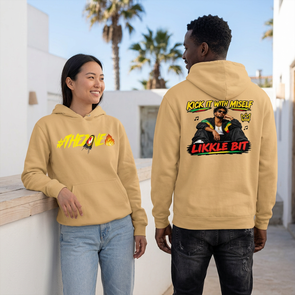 Golden sand hoodie lifestyle image with woman showing the front and man showing the back in a coastal courtyard