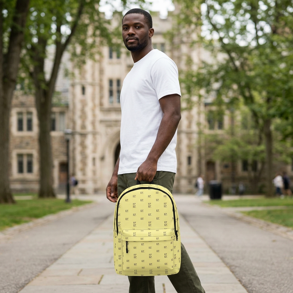 Male model carrying the pale-yellow backpack on campus