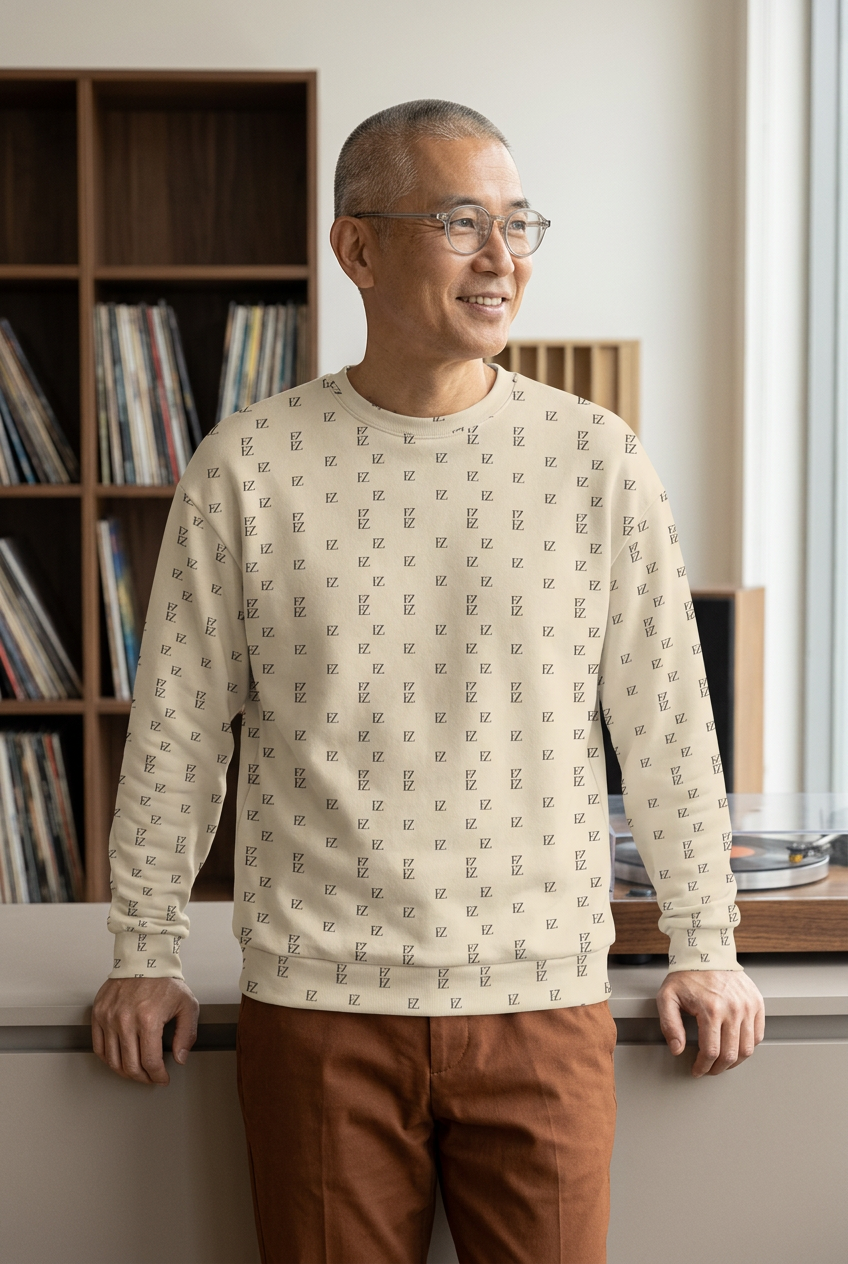 Silver-haired Japanese man in a vinyl listening lounge