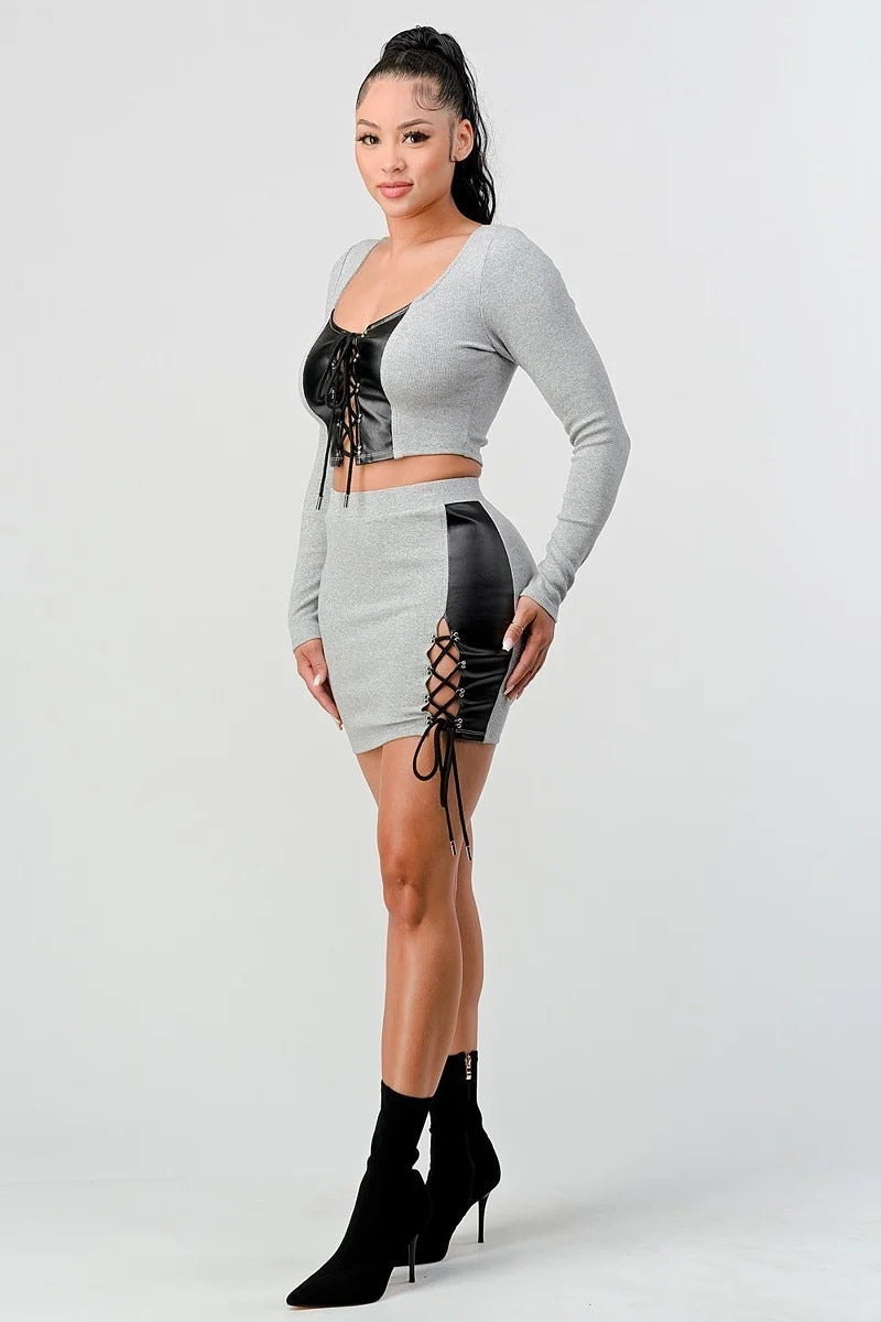 2 piece set with cropped long sleeve shirt with pu leather detail matching mini skirt