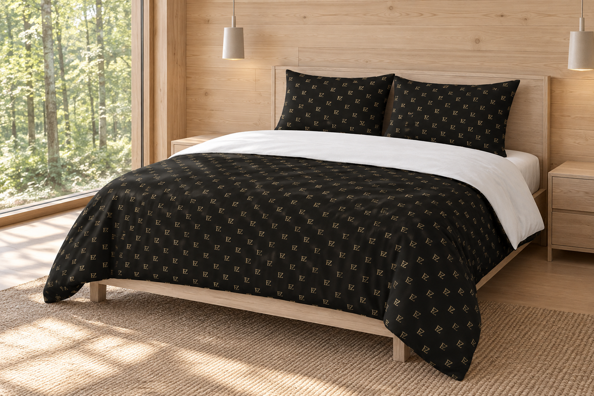 Black monogram bedding in a light-wood forest retreat