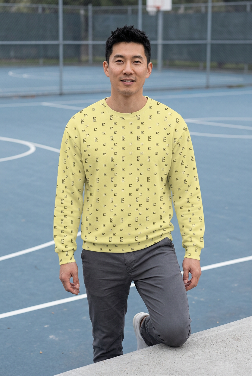 Korean man perched beside an outdoor basketball court