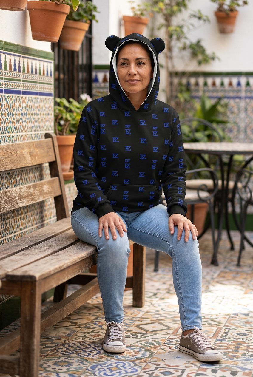 Latina woman seated in the hoodie