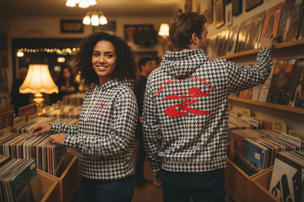 Two friends in a record store with the hoodie front and back clearly visible